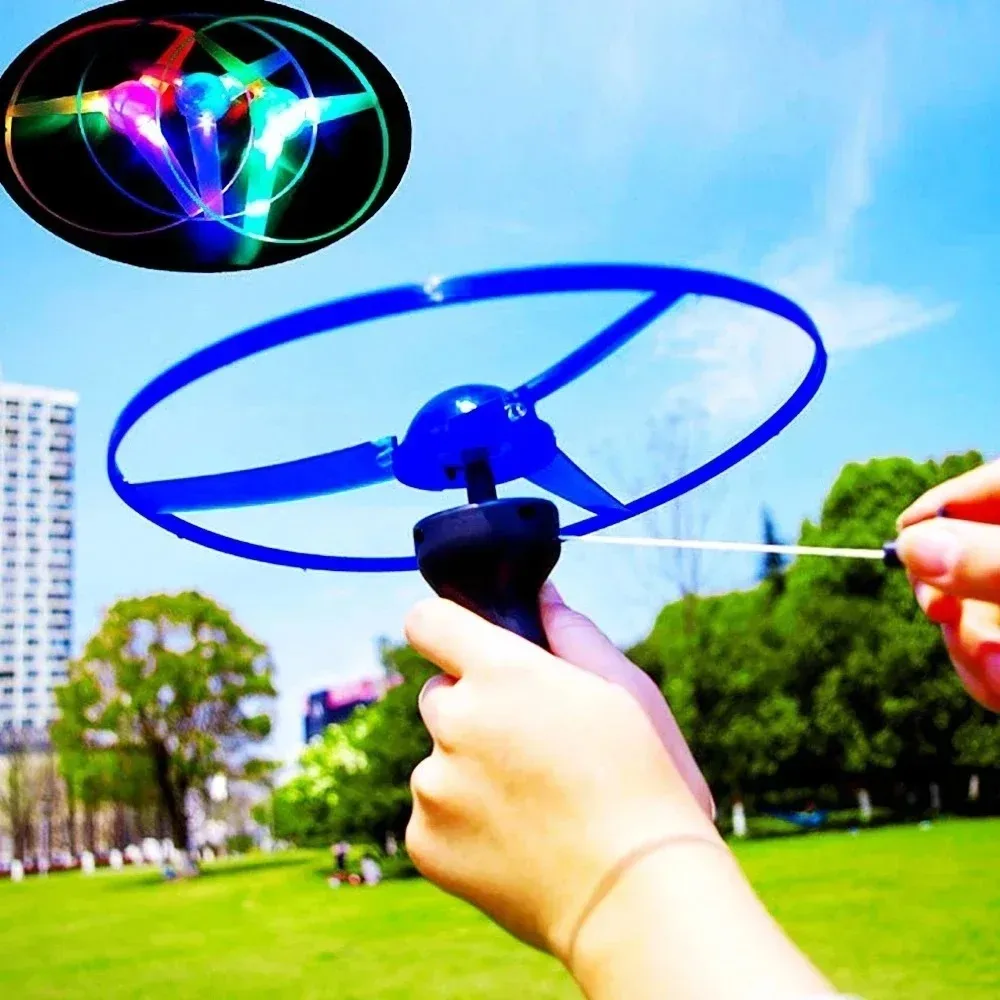 Light-up flying disc for kids with pull handle and LED lights